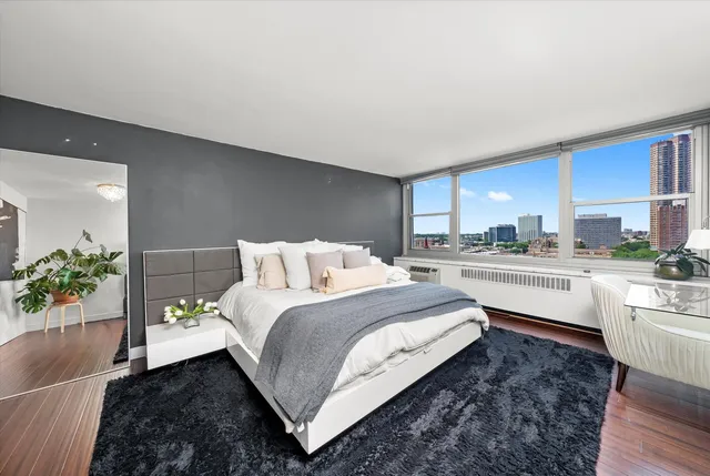 a bed room with a bed and a couch