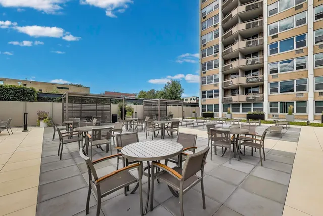 a view of a dinning tables and chairs in the patio