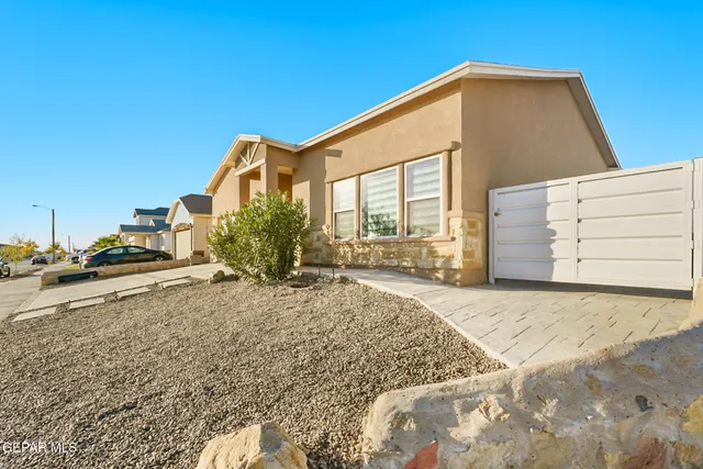 a view of a house with a swimming pool