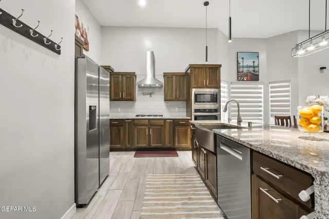 a bedroom with a bed and a night stand