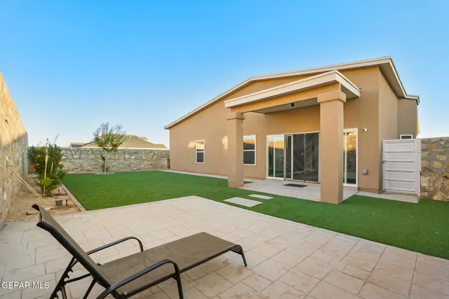 a view of a car parked in front of a house