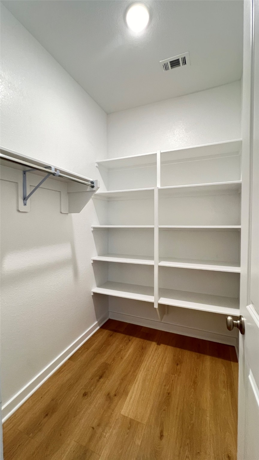 124 Stephens Rdg Lane Montgomery, TX 77316 - Photo 17 of 40 a view of walk in closet with empty racks