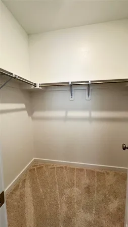 a bathroom with a toilet a sink and bathtub