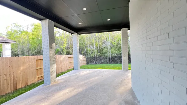 a view of backyard with green space