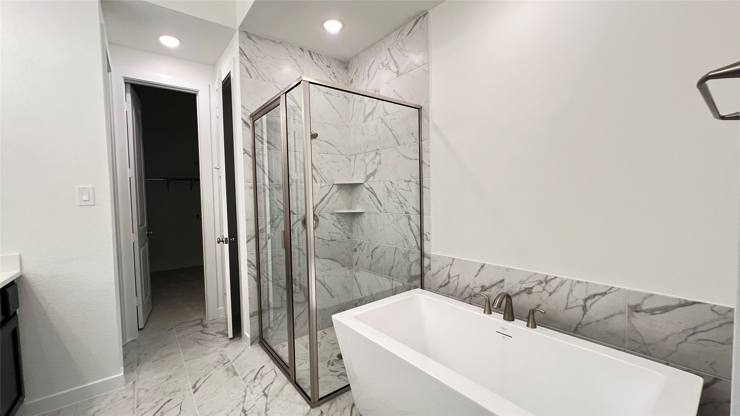 124 Stephens Rdg Lane Montgomery, TX 77316 - Photo 35 of 40 a bathroom with a bathtub a toilet and a shower