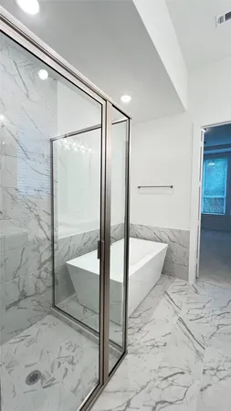 a bathroom with a sink double vanity and a mirror