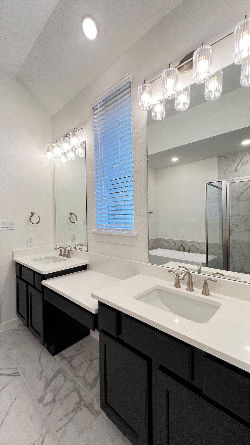 124 Stephens Rdg Lane Montgomery, TX 77316 - Photo 39 of 40 a bathroom with a sink double vanity and a mirror
