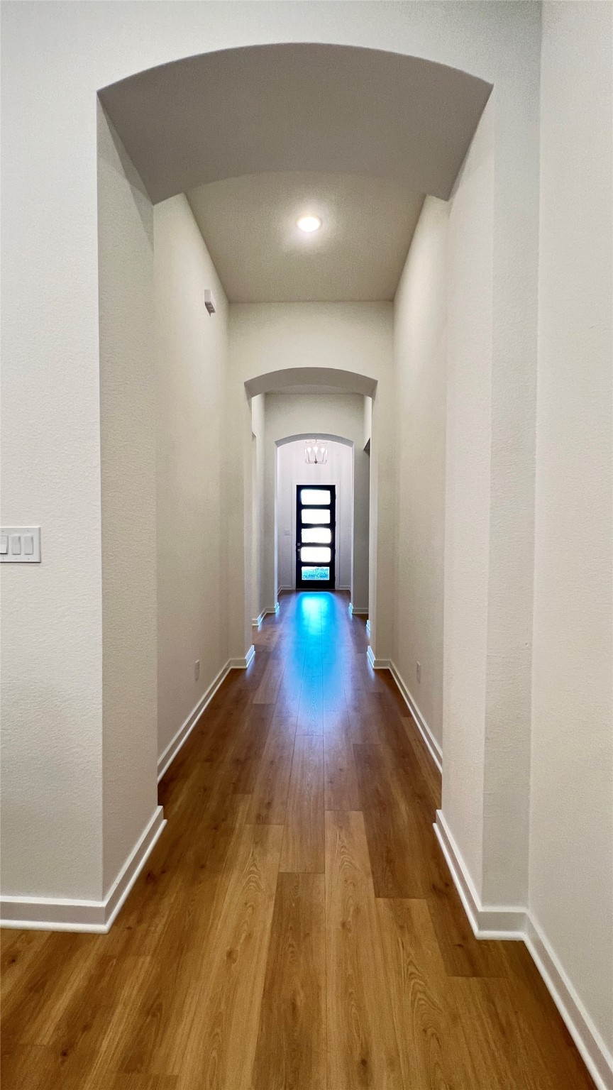 124 Stephens Rdg Lane Montgomery, TX 77316 - Photo 8 of 40 a view of gallery with wooden floor