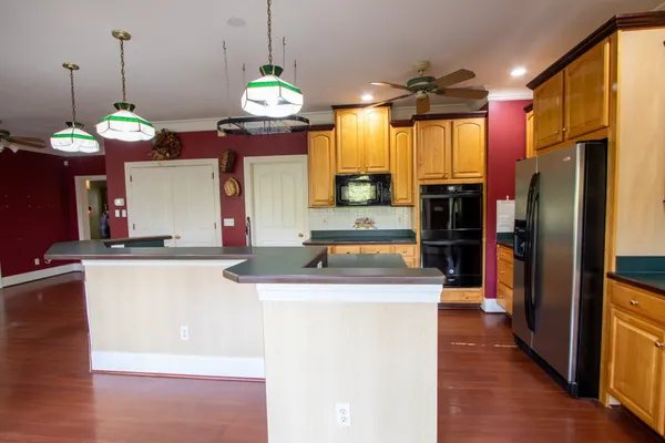 a view of livingroom with furniture window and wooden floor