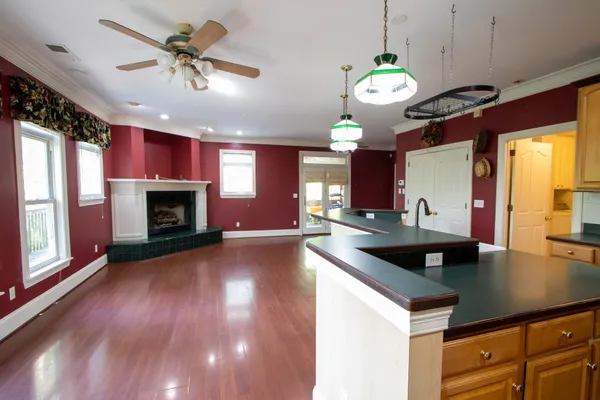 a kitchen with stainless steel appliances granite countertop a stove and refrigerator