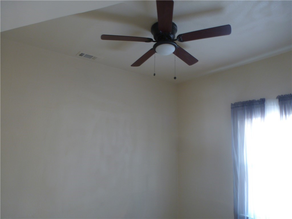 1044 West 20th Street Merced, CA 95340 - Photo 11 of 25 a view of a hallway
