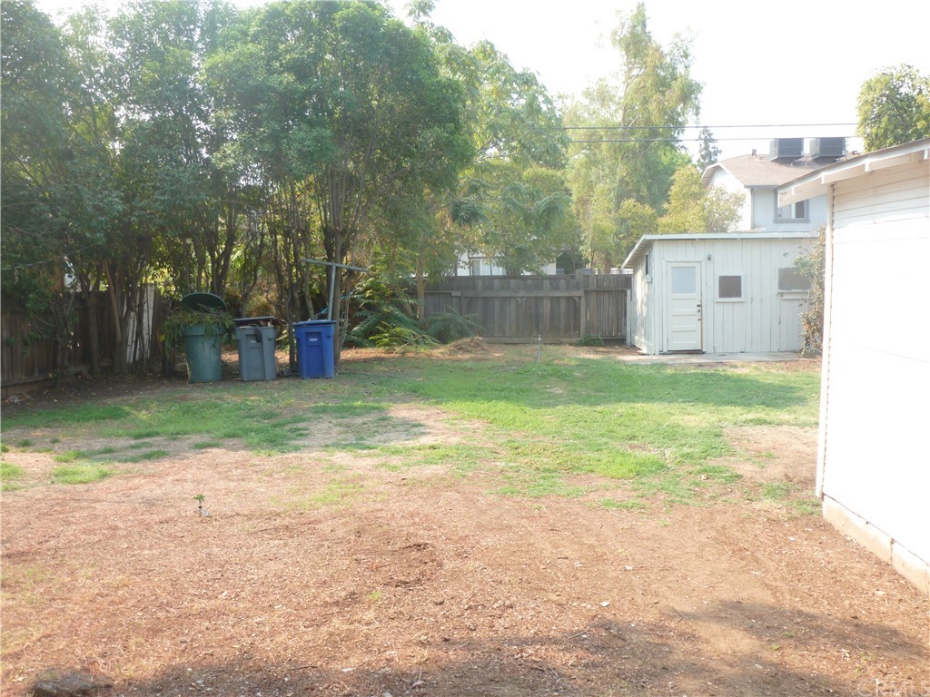 1044 West 20th Street Merced, CA 95340 - Photo 25 of 25 a view of a yard with a slide