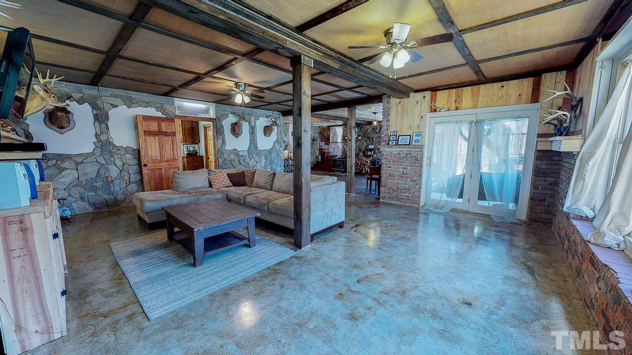 1530 Rolling Hills Road Roxboro, NC 27574 - Photo 22 of 30 So many options for the huge, bright finished space!