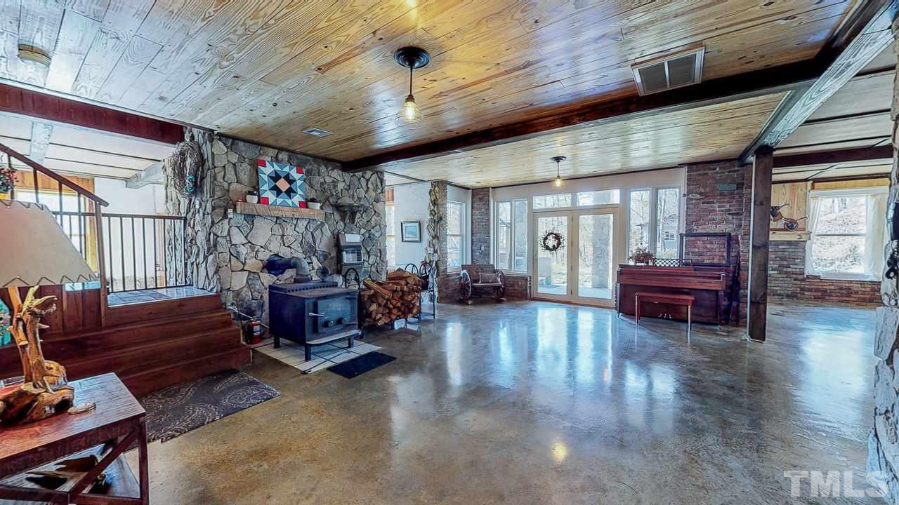 1530 Rolling Hills Road Roxboro, NC 27574 - Photo 6 of 30 The spacious finished basement walks out to the back patio!