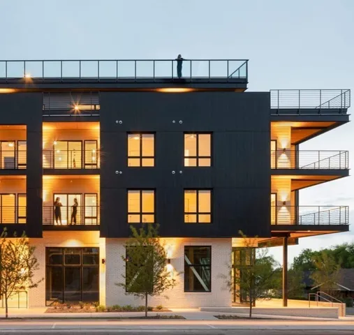 a front view of a building with a glass door