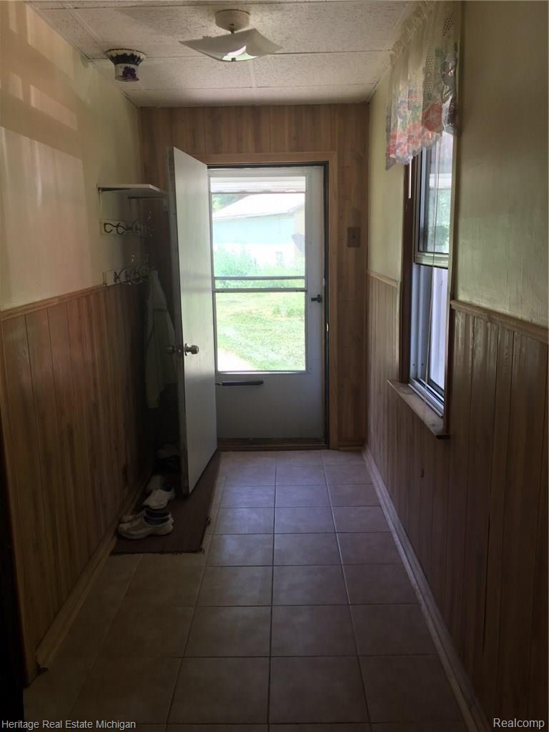 8015 Coyle Road Whitmore Lake, MI 48189 - Photo 10 of 18 single family ranch back entry