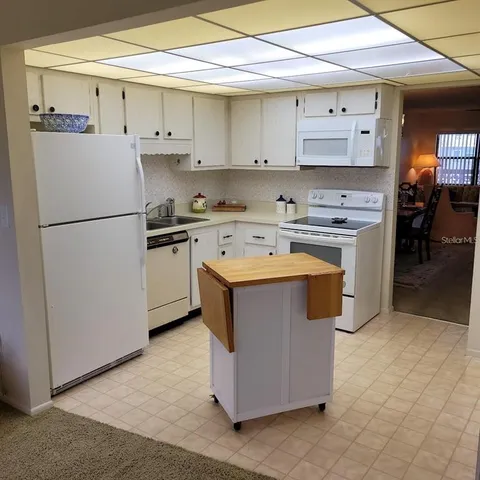 a utility room with washer and dryer