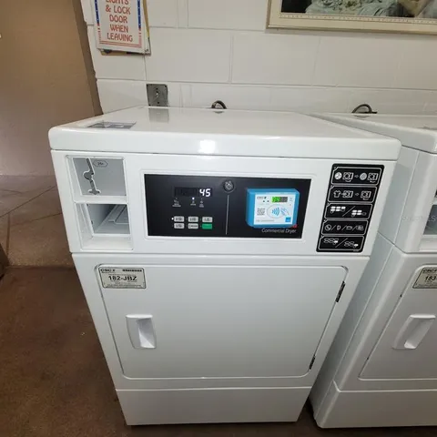 a room with dryer and washer