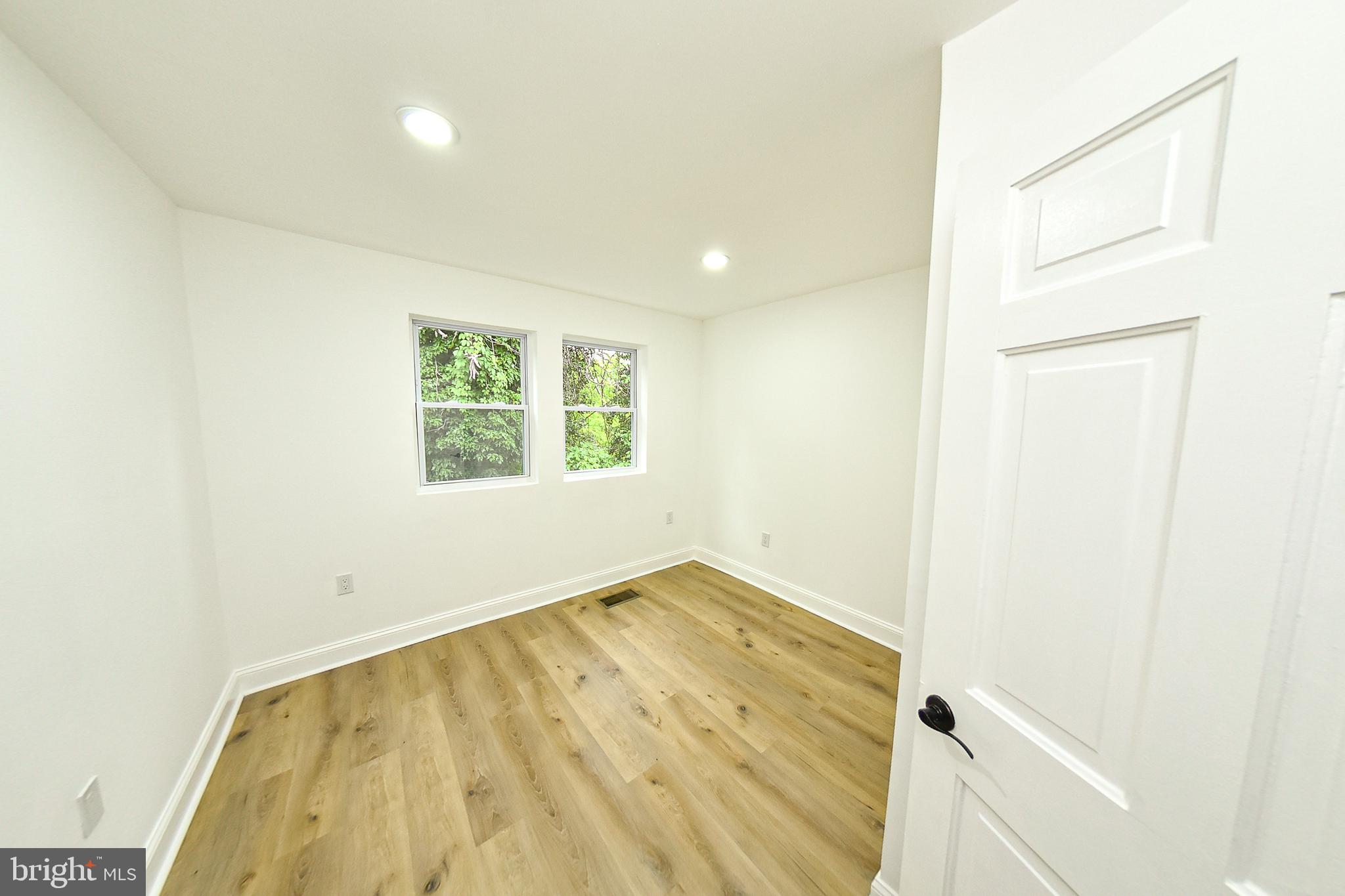 3704 Suitland Road Southeast Washington, DC 20020 - Photo 30 of 70 an empty room with a window
