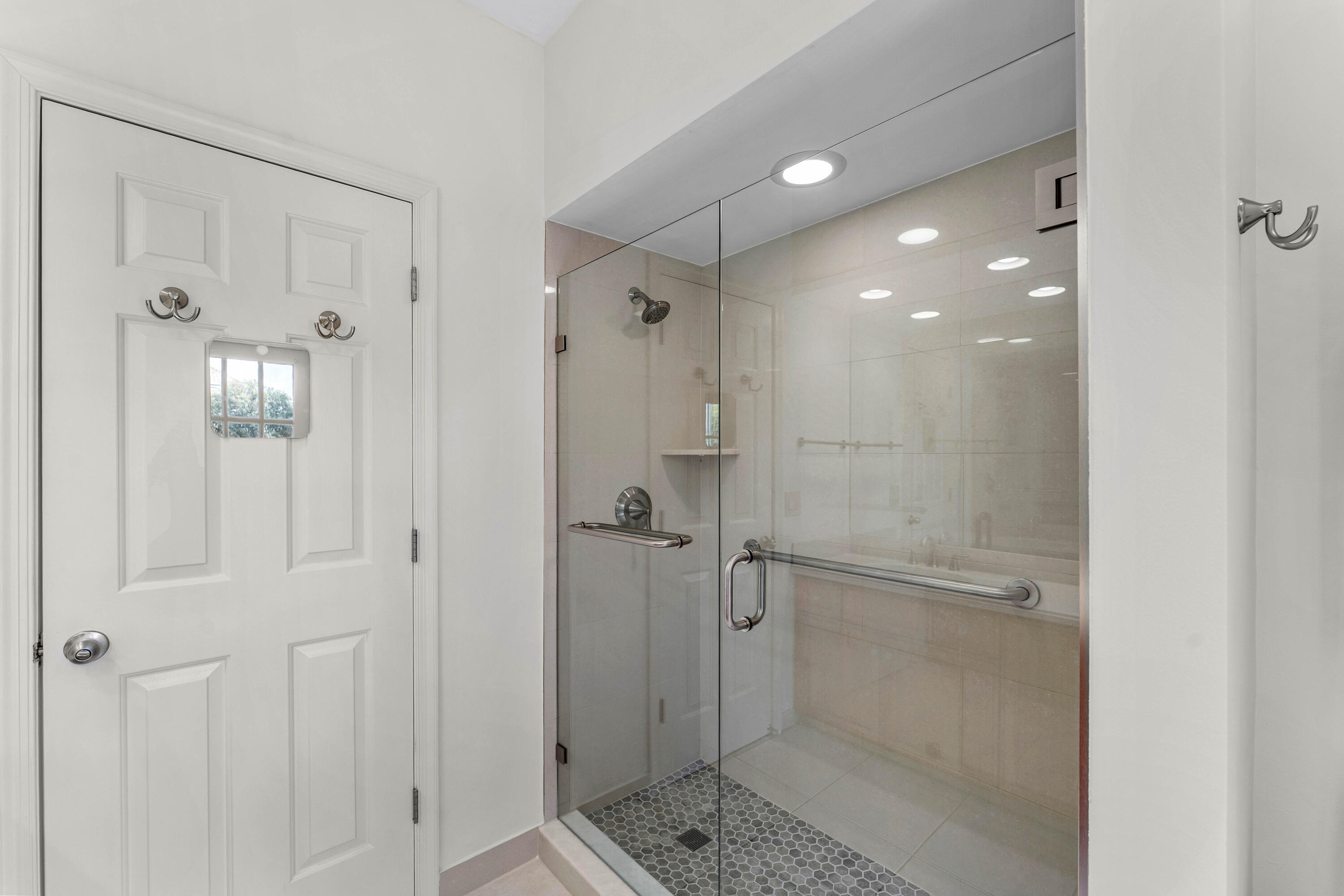 1851 Thatch Palm Drive Boca Raton, FL 33432 - Photo 41 of 70 a bathroom with a shower