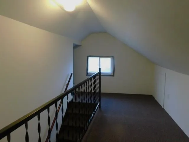 a view of hallway with stairs
