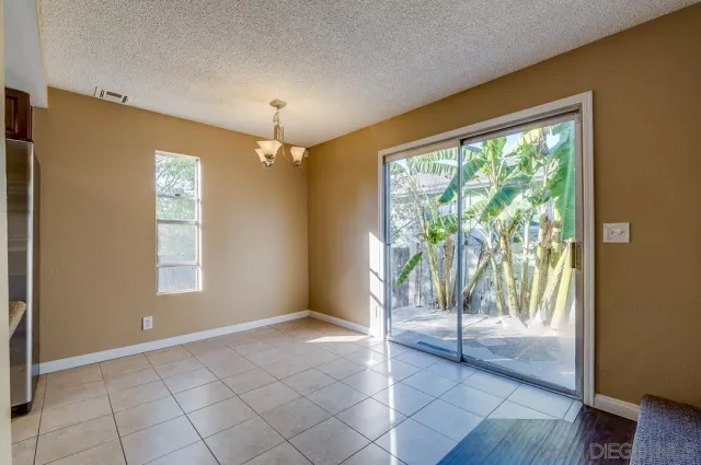 a view of a tree in front of a house