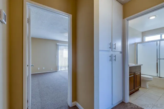 a view of a hallway with an empty room
