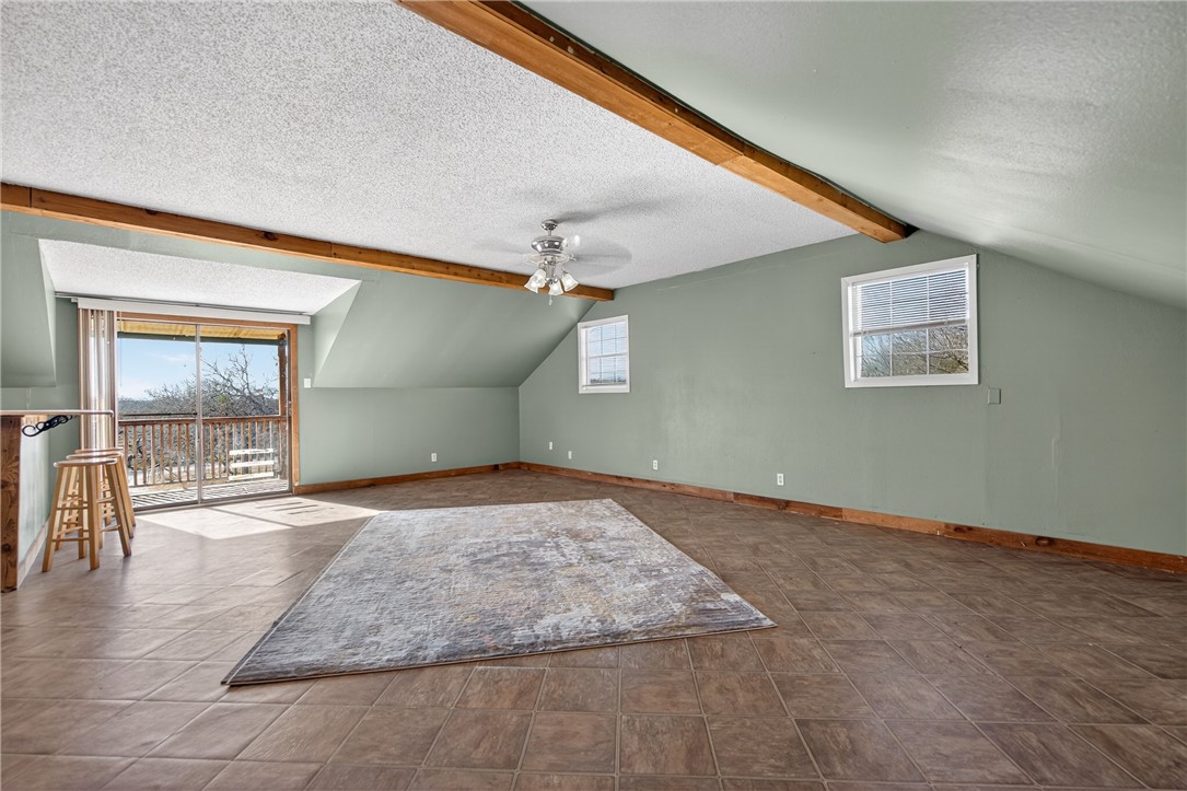 5752 Mockingbird Lane Mathis, TX 78368 - Photo 22 of 35 a view of empty room with wooden floor and fan