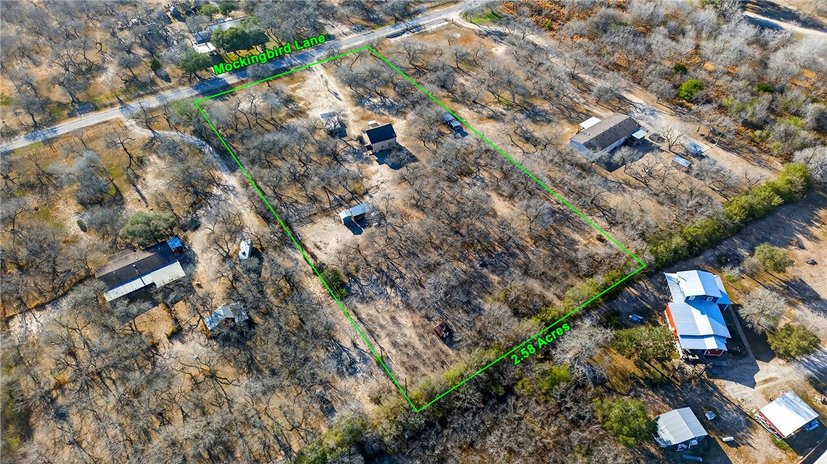 5752 Mockingbird Lane Mathis, TX 78368 - Photo 32 of 35 an aerial view of house with yard