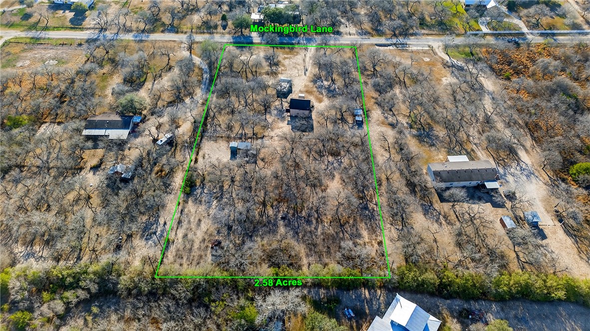5752 Mockingbird Lane Mathis, TX 78368 - Photo 33 of 35 an aerial view of residential house with outdoor space