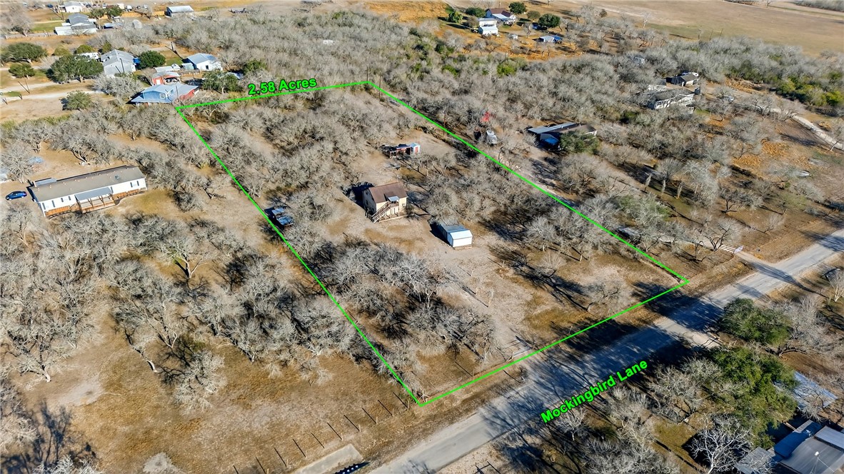 5752 Mockingbird Lane Mathis, TX 78368 - Photo 35 of 35 a view of a field with plants and trees