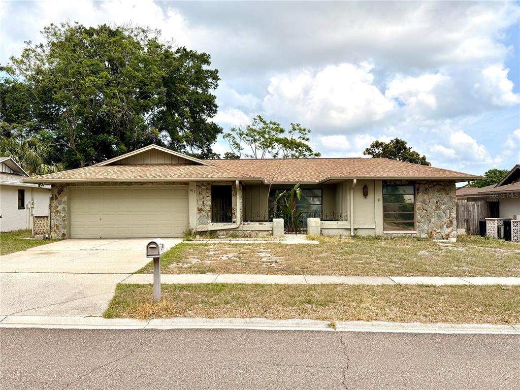 613 Sandy Hollow Road Tarpon Springs, FL 34689 - Photo 1 of 1 a view of a house with a entertaining space