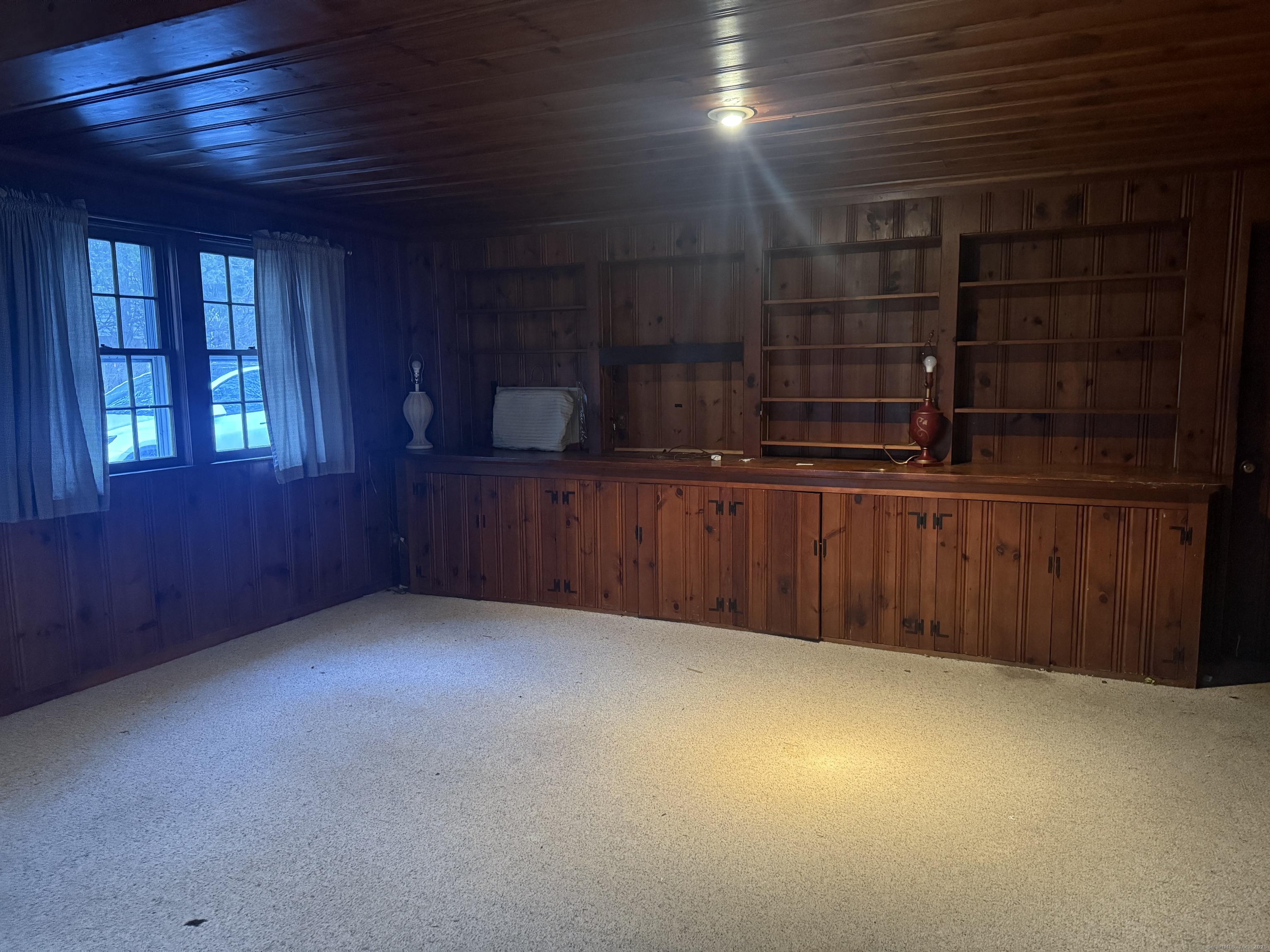 8 Nelson Place Fairfield, CT 06825 - Photo 27 of 32 a view of an empty room with furniture