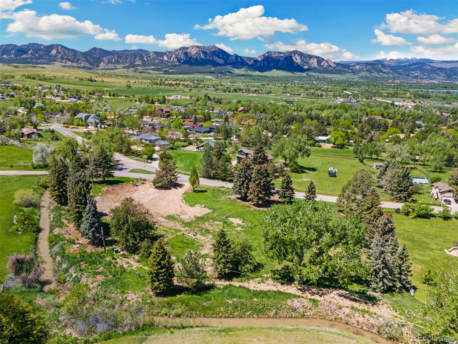 460 Paragon Drive Boulder, CO 80303 - Photo 12 of 16 a view of a lush green hillside and houses