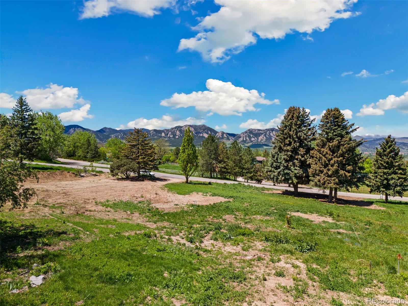 460 Paragon Drive Boulder, CO 80303 - Photo 5 of 16 a backyard of a house with lots of green space