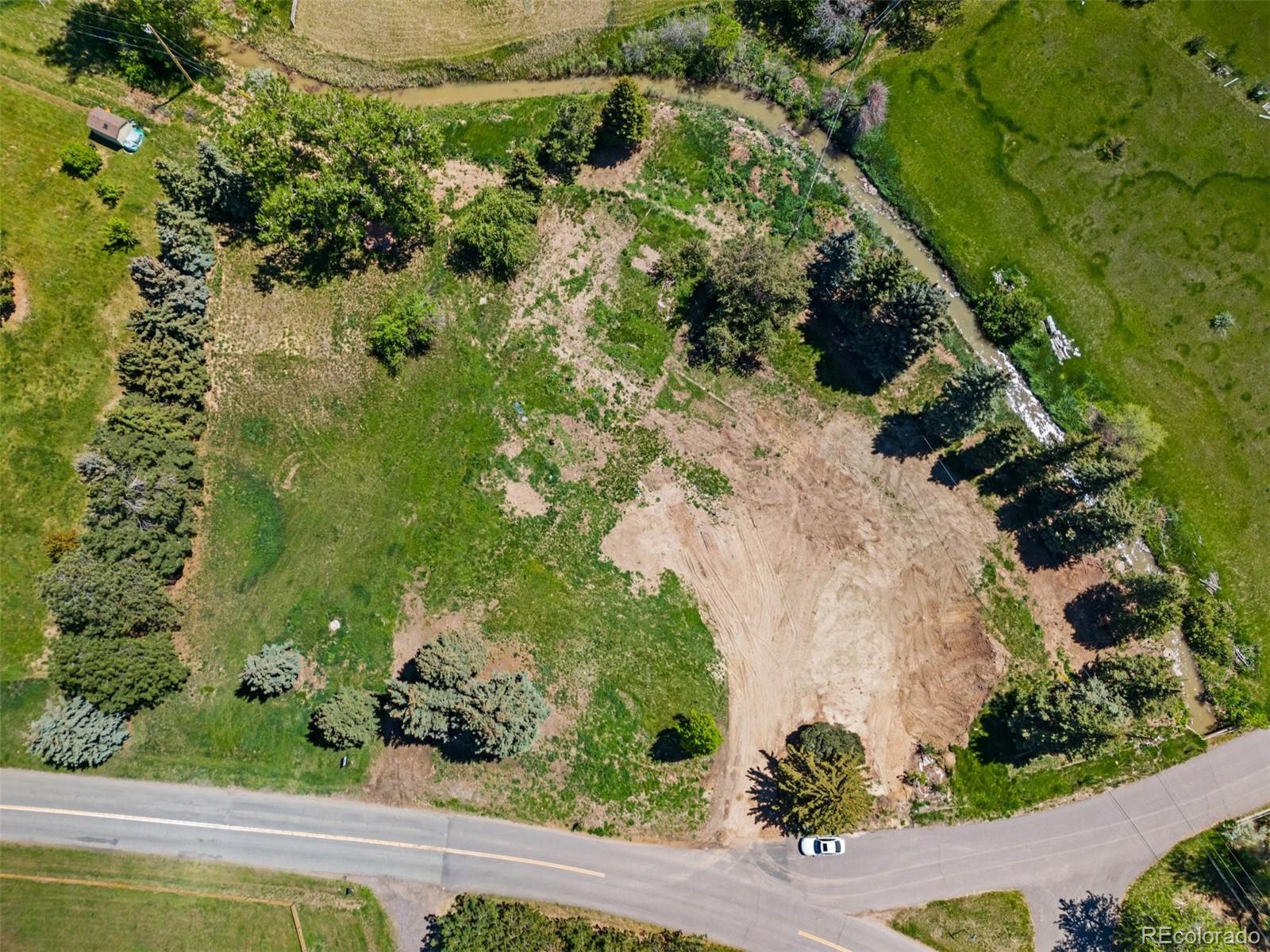 460 Paragon Drive Boulder, CO 80303 - Photo 8 of 16 an aerial view of a house with a yard