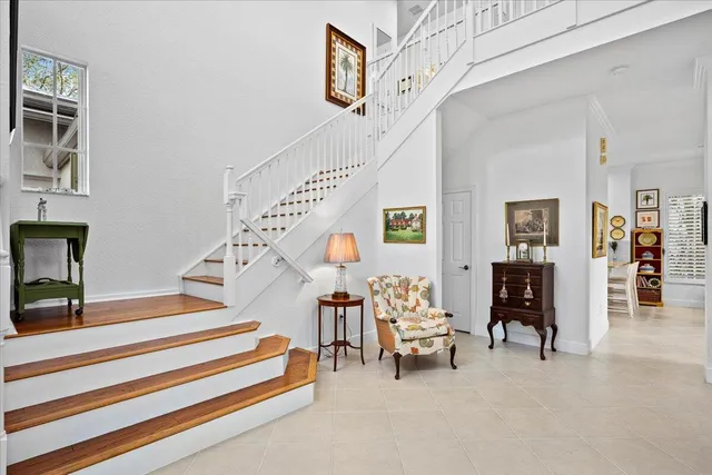 a bedroom with a bed furniture and window