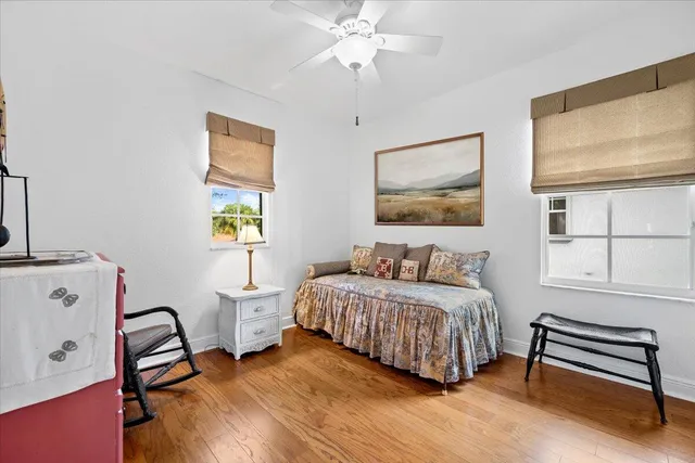 a front view of a house with a yard and porch