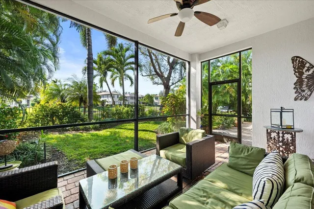 an aerial view of residential house with outdoor space and swimming pool