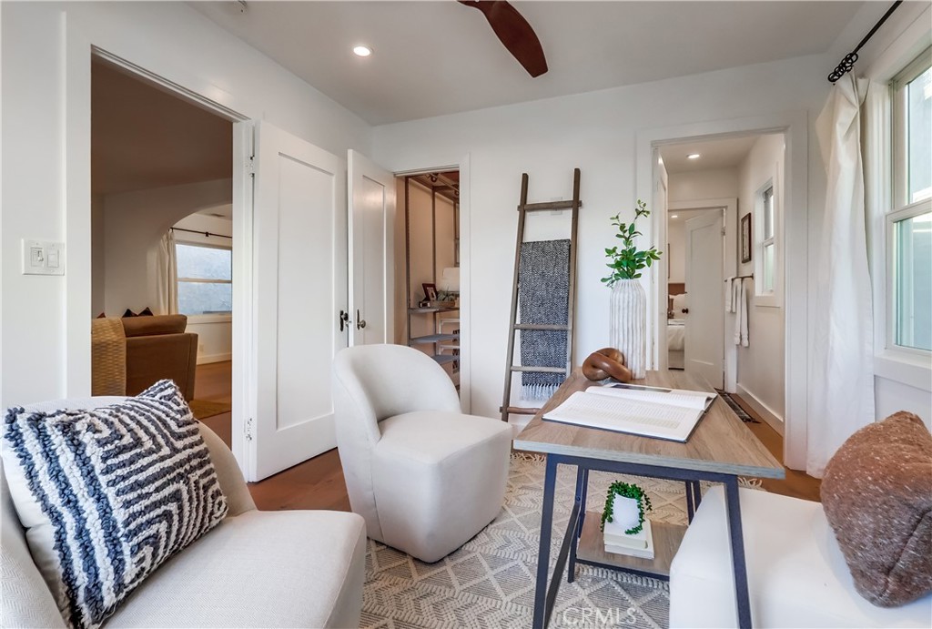 1007 Marview Avenue Los Angeles, CA 90012 - Photo 15 of 27 a living room with furniture and wooden floor