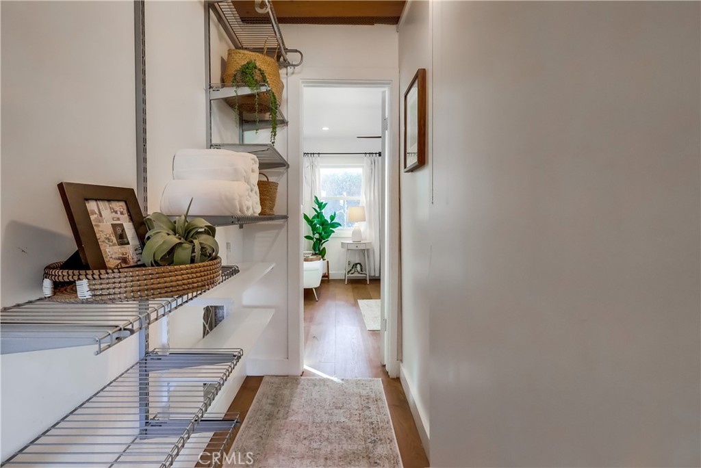 1007 Marview Avenue Los Angeles, CA 90012 - Photo 16 of 27 a living room with furniture and a potted plant