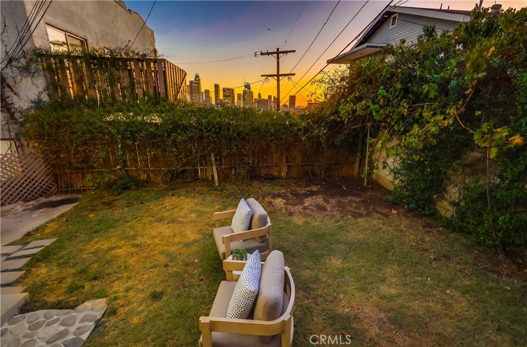 1007 Marview Avenue Los Angeles, CA 90012 - Photo 19 of 27 a backyard of a house with lots of green space