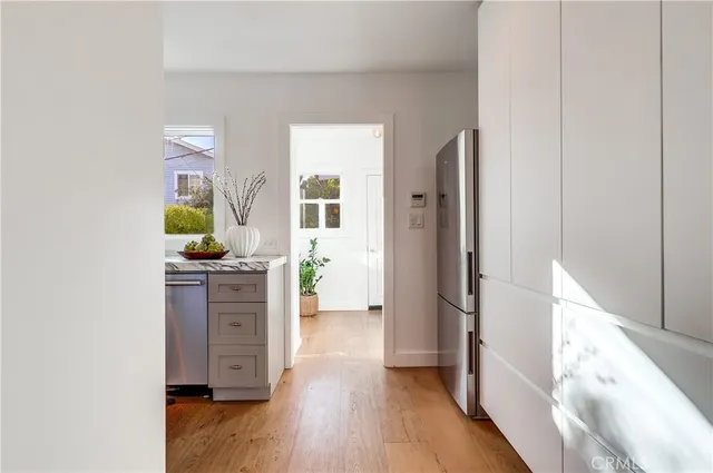 a room with furniture and a wooden floor