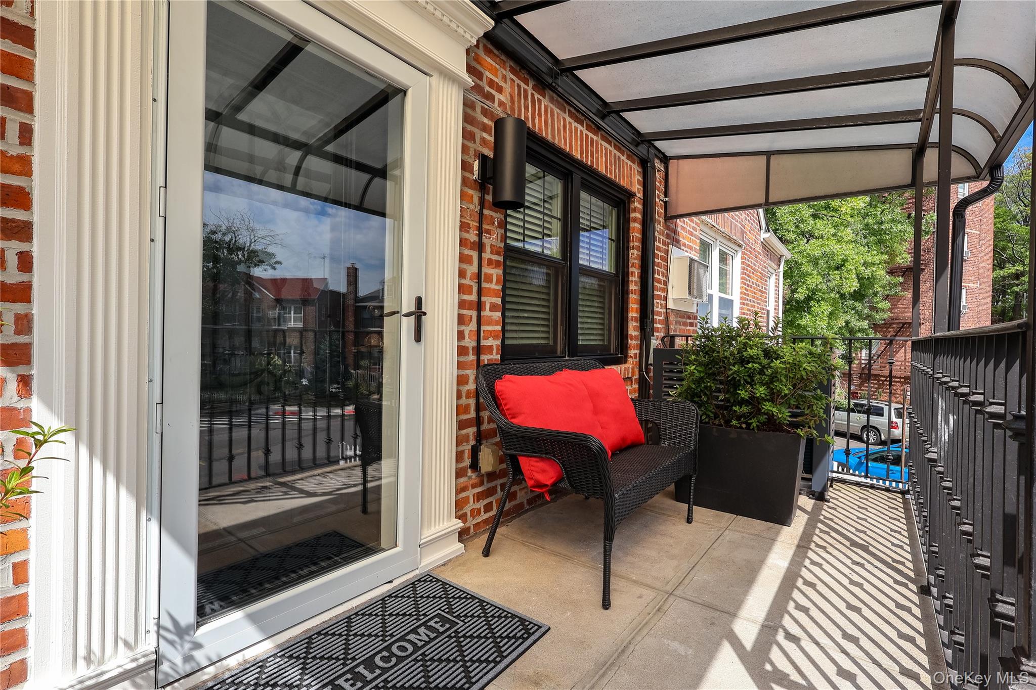 67-04 Selfridge Street, Unit 2 Queens, NY 11375 - Photo 2 of 21 a view of outdoor space patio and outdoor seating