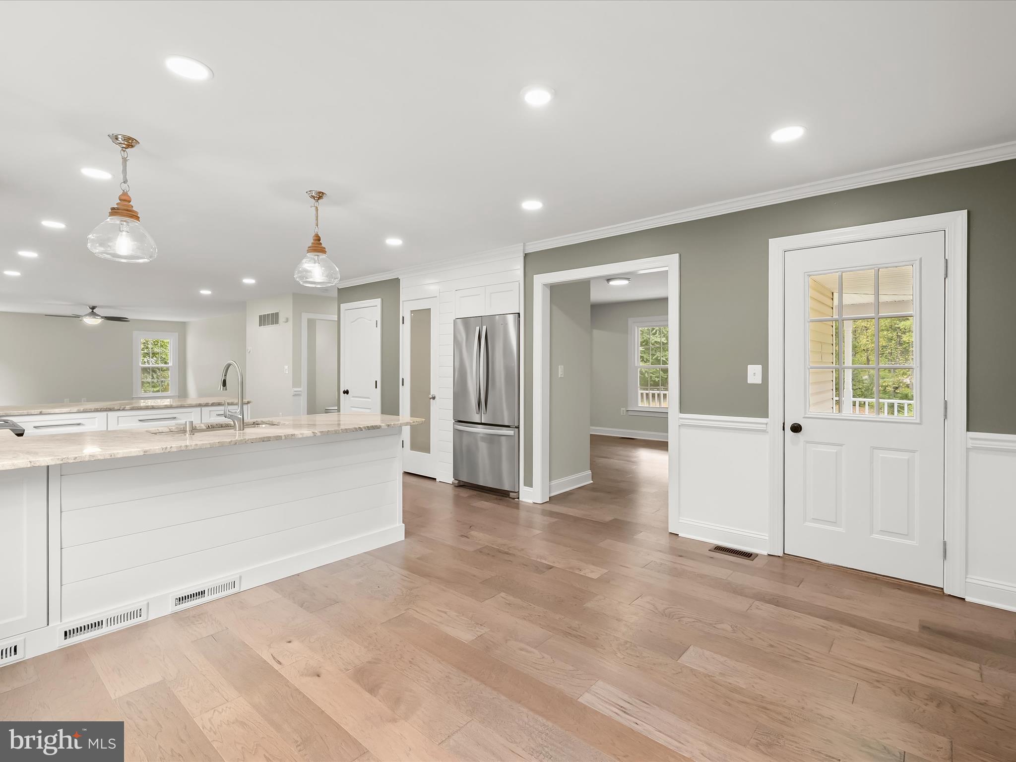 3720 Buffalo Road New Windsor, MD 21776 - Photo 15 of 115 an empty room with wooden floor and windows