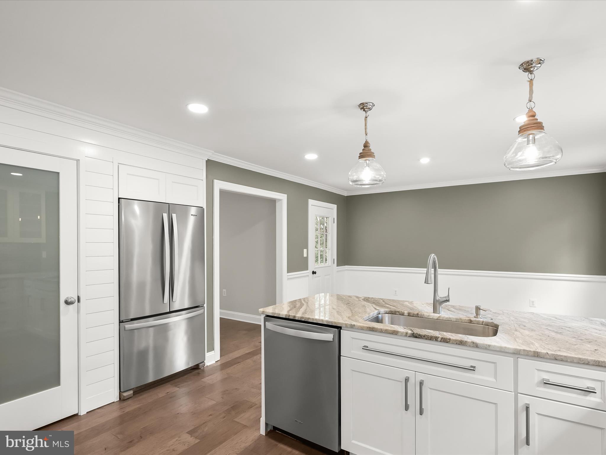 3720 Buffalo Road New Windsor, MD 21776 - Photo 19 of 115 a kitchen with stainless steel appliances granite countertop a refrigerator and a sink