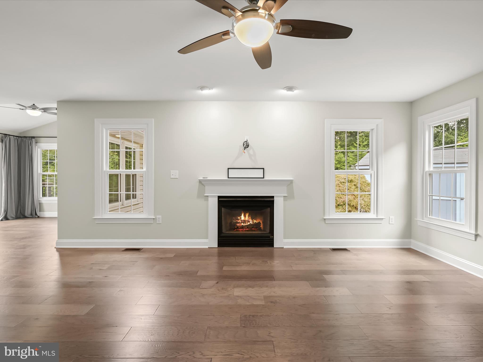 3720 Buffalo Road New Windsor, MD 21776 - Photo 24 of 115 a view of an empty room with window and fire place