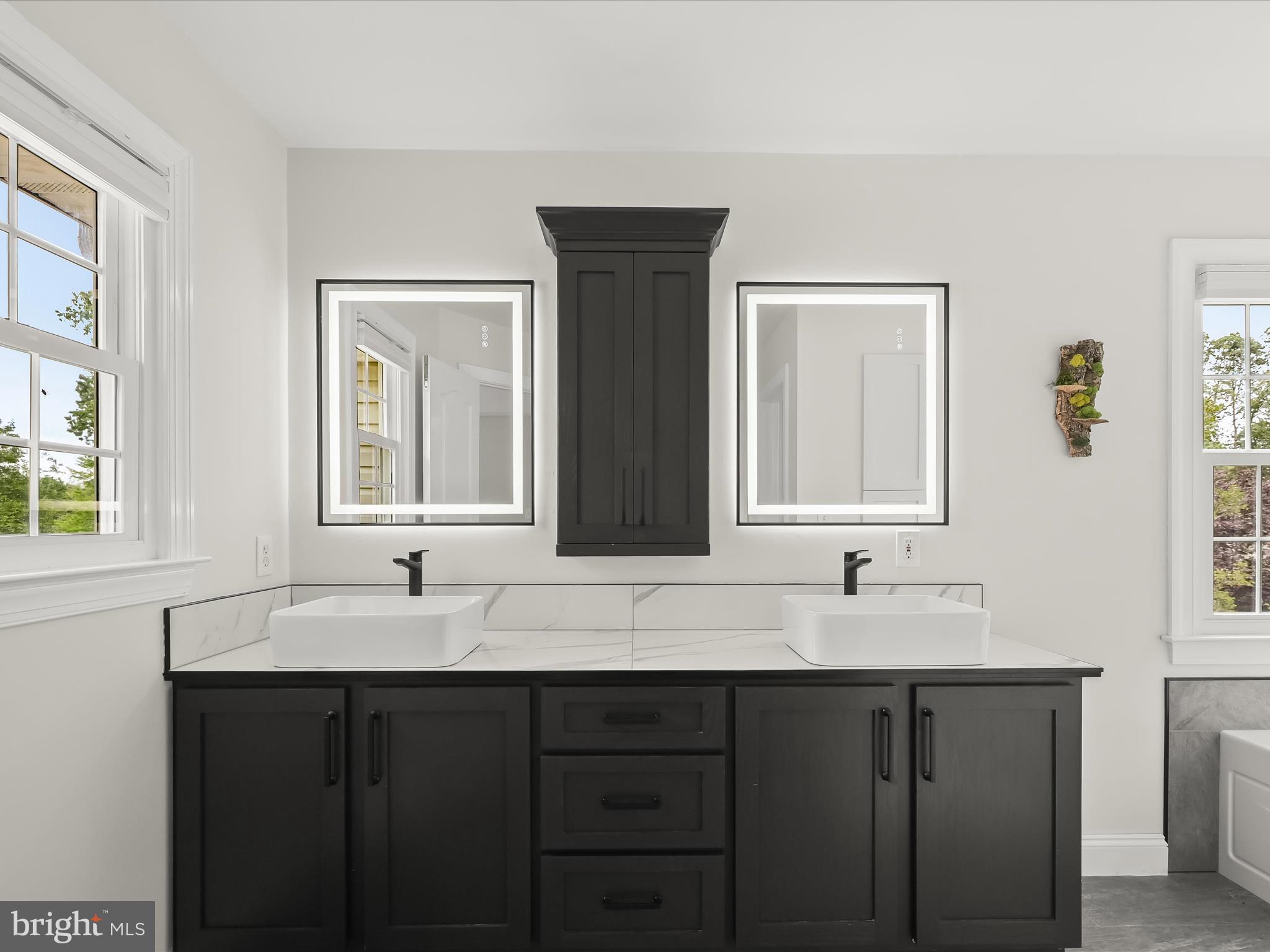 3720 Buffalo Road New Windsor, MD 21776 - Photo 33 of 115 a bathroom with a double vanity sink and mirror