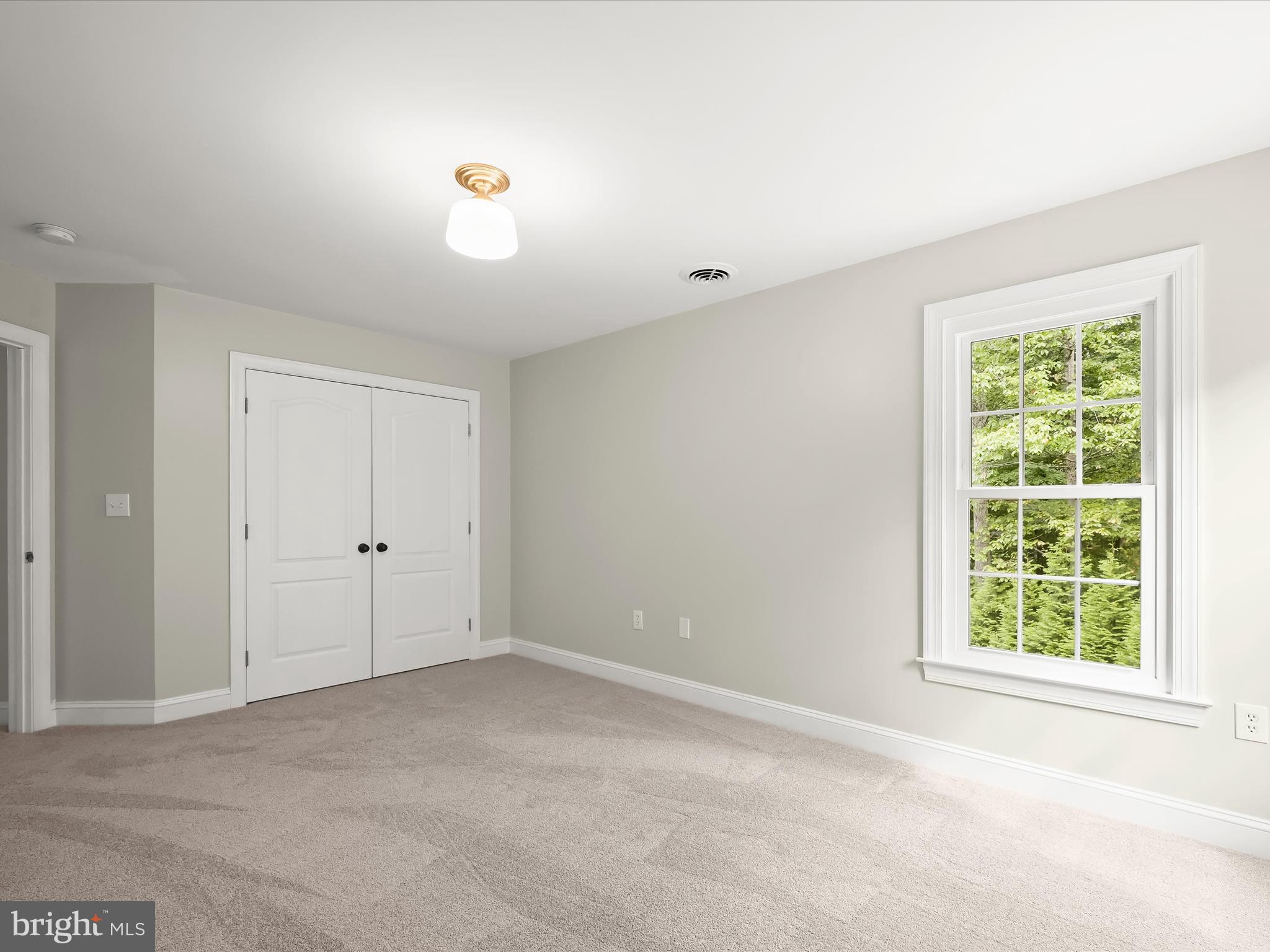 3720 Buffalo Road New Windsor, MD 21776 - Photo 46 of 115 a view of an empty room with a window