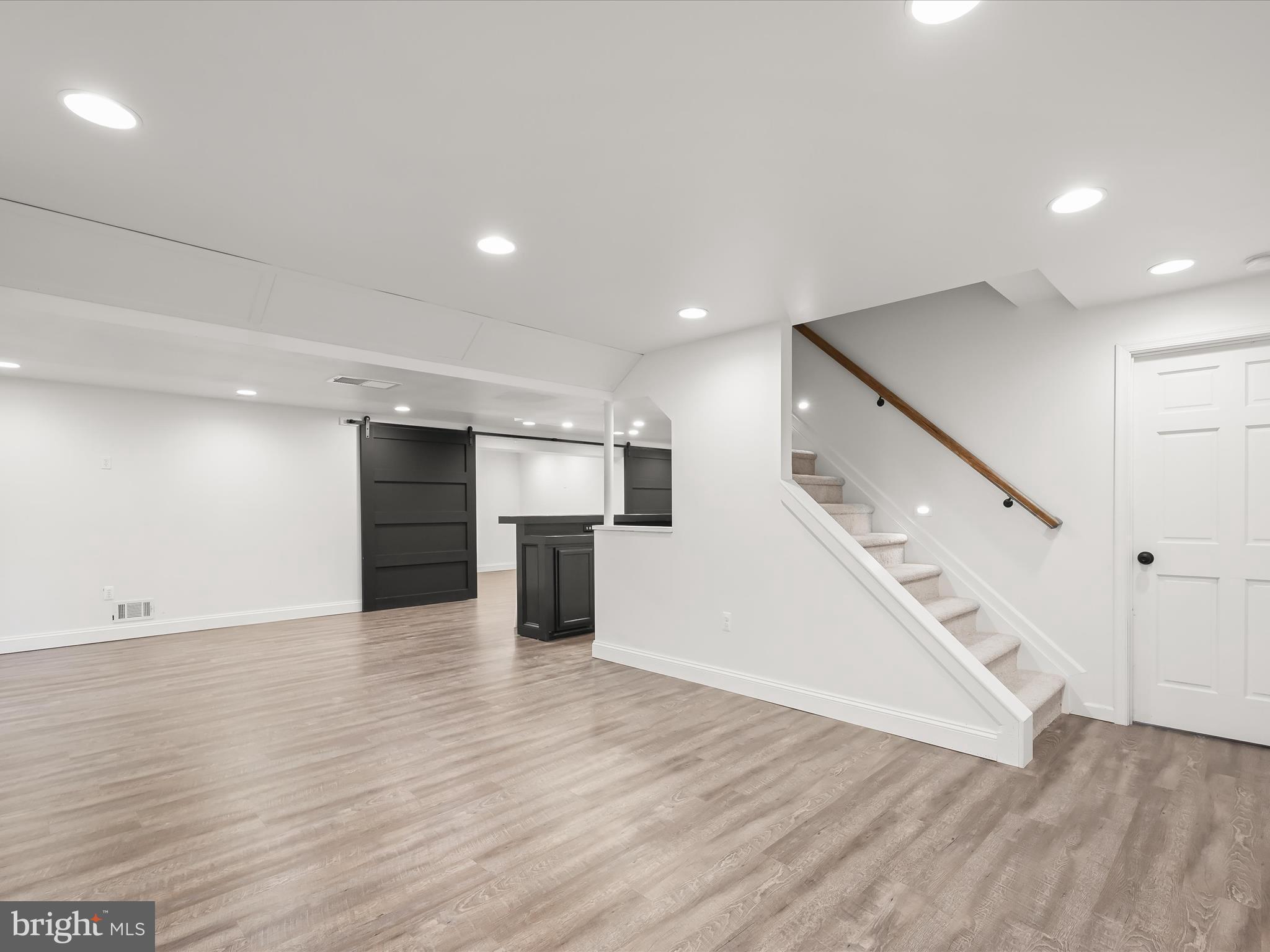 3720 Buffalo Road New Windsor, MD 21776 - Photo 52 of 115 a view of an empty room with wooden floor